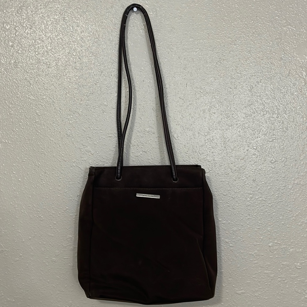 Brown shoulder bag. Compact.